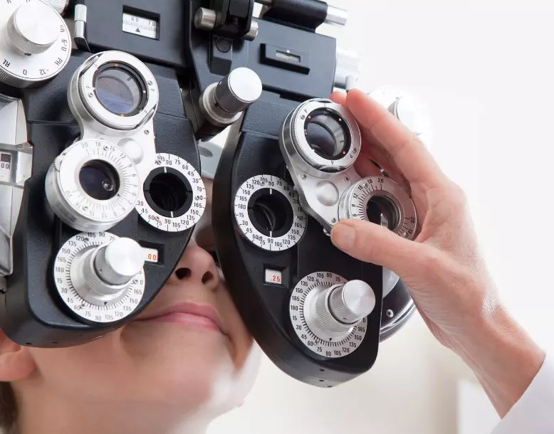 A person undergoes an eye exam