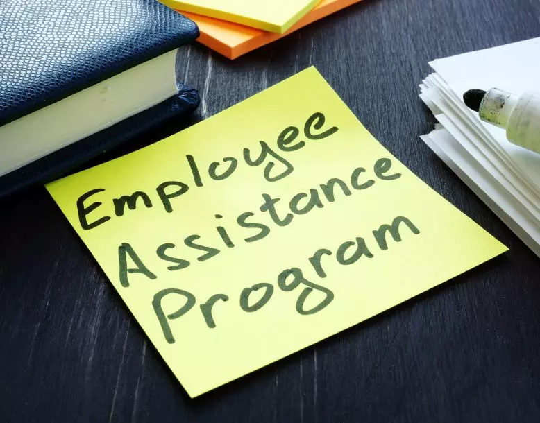 A sticky note says "Employee Assistance Program"