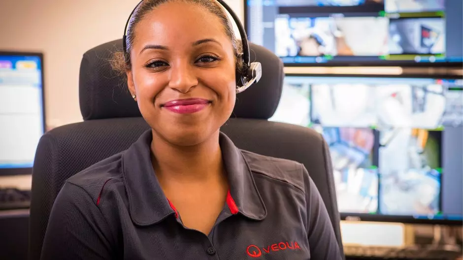 A Veolia employee smiles for the camera